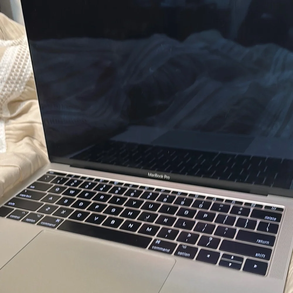 Apple Silver MacBook Pro with Backlit Keyboard and Touchpad